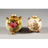 A ROYAL WORCESTER SPHERICAL TWO HANDLED VASE, on three feet painted with roses C.1912 and a