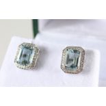 A GOOD PAIR OF 18CT GOLD, AQUAMARINE AND DIAMOND EARRINGS.