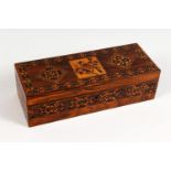 A GOOD TUNBRIDGE WARE LONG BOX, the hinged top inlaid with a bird and parquetry, parquetry to the