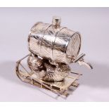 A GOOD SILVER PLATE RUSSIAN BEAR KEG on a sleigh.