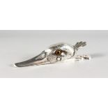 A SILVER PLATE DUCK PAPER CLIP.