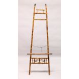 A LATE 19TH CENTURY BAMBOO EASEL. 5ft 8ins high.
