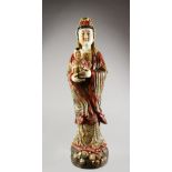 A LARGE PORCELAIN FIGURE OF GUANYIN.