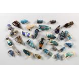 A COLLECTION OF THIRTY ROMAN-TYPE GLASS MINIATURES.