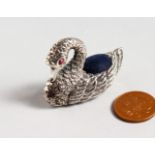 A CAST SILVER NOVELTY SWAN PIN CUSHION.