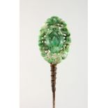 A CHINESE CARVED JADE HAIRPIN. 7ins long.