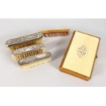 AN IVORY MOUNTED PRAYER BOOK, and three silver backed moustache brushes (4). Book: 3.75ins high.