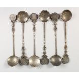 SIX CHINESE WHITE METAL COIN SPOONS. 6.5ins long.
