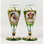 A PAIR OF 19TH CENTURY BOHEMIAN GREEN GLASS VASES, each with an oval panel painted with a portrait