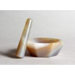 AN AGATE MINIATURE PESTLE AND MORTAR. 2.5ins wide.
