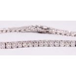 A VERY IMPRESSIVE 14CT WHITE GOLD DIAMOND SET LINE BRACELET of 7.5cts.