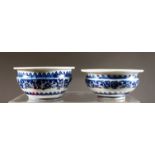 A PAIR OF CHINESE BLUE AND WHITE CIRCULAR BOWLS. 5.75ins diameter.