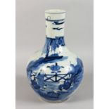 A CHINESE BLUE AND WHITE BOTTLE VASE, decorated with figures by a fence. 13.5ins high.