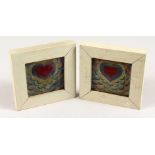 A PAIR OF SMALL LUSTRE DECORATED FRAMED TILES. 4.25ins wide.