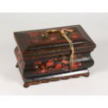 A GOOD 19TH CENTURY FLORAL PAINTED TOLEWARE CASKET, with velvet lined wooden interior. 10ins wide.