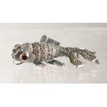 A SILVER AND MARCASITE ARTICULATED FISH BROOCHES.