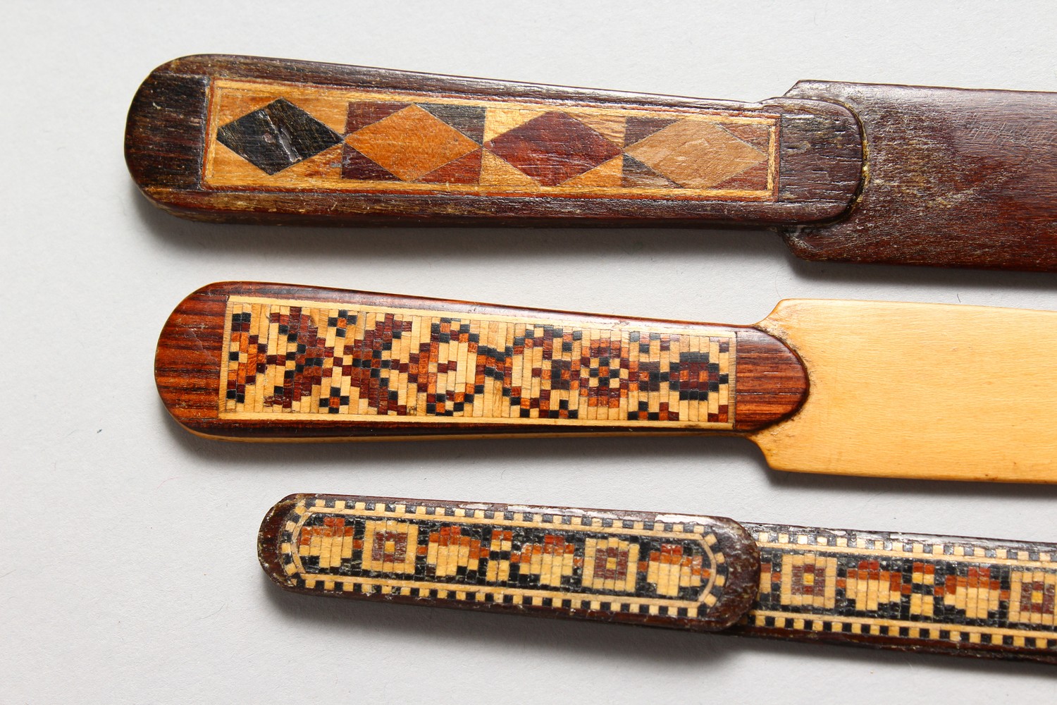 THREE TUNBRIDGE WARE PARQUETRY PAPER KNIVES. 5ins, 7ins and 7.5ins long. - Image 2 of 4