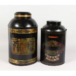 A CHINESE BLACK JAPANNED TEA CANISTER, and a similar coffee canister. 13ins and 15.5ins high.