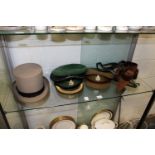 A top hat, military caps and a Sam Browne.