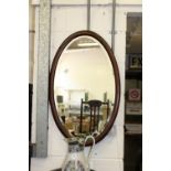An oval mirror.