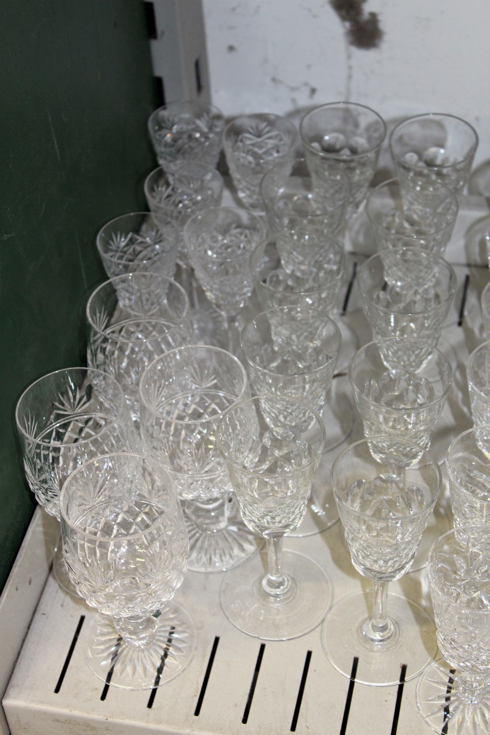 A shelf of cut glass drinking glasses. - Image 2 of 5