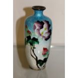 A small wireless cloisonne vase.