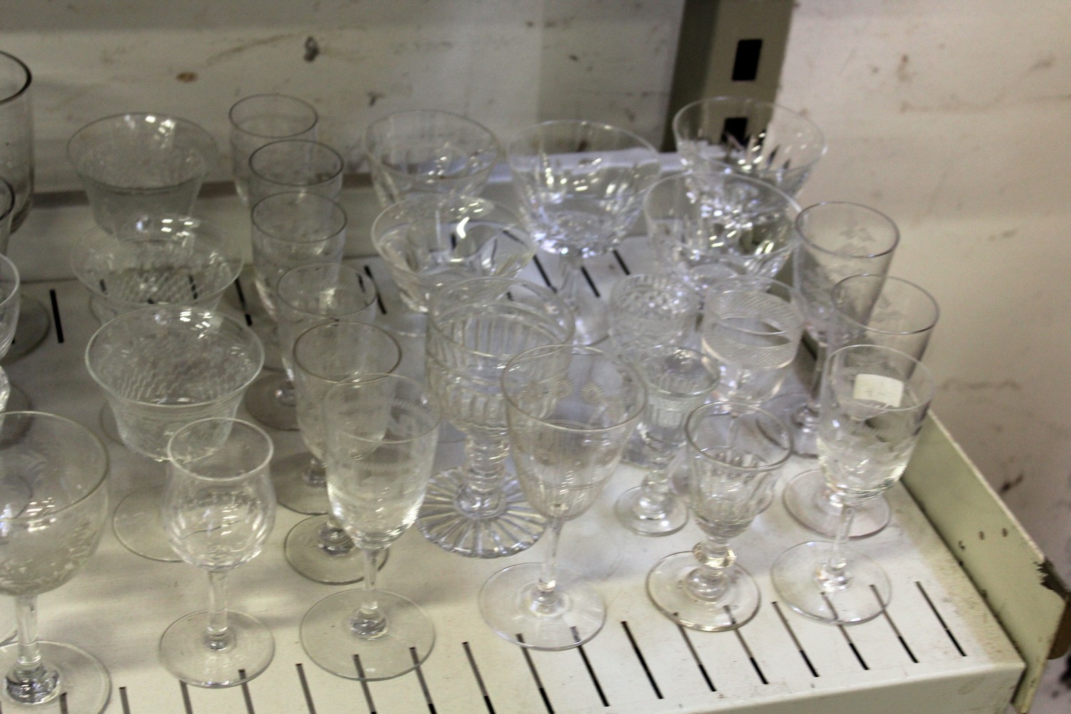 A shelf of cut glass drinking glasses. - Image 4 of 4