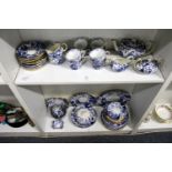 A quantity of Royal Crown Derby chinoiserie decorated blue and white tea and dinner ware.