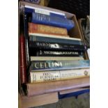 A box of art and antique related reference books.