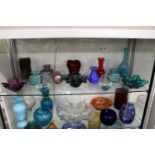 A good collection of colourful glassware to include vases, bowls etc.