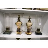A pair of storm lanterns and a pair of alabaster and ormolu lamp bases.