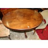 A Victorian oval rosewood tilt top breakfast table.