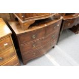 A George III mahogany bow front chest of two short and two long drawers on bracket feet.