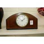 An Edwardian small mahogany mantle clock.