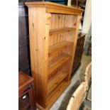 A pine open bookcase.