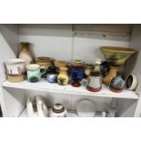 A collection of modern Mocha ware style bowls, mugs, vases etc.