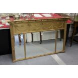 A Regency style gilt wood over mantle mirror.