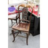 A late 19th century Chinese dining chair with carved splat, solid seat on cabriole legs (faults).