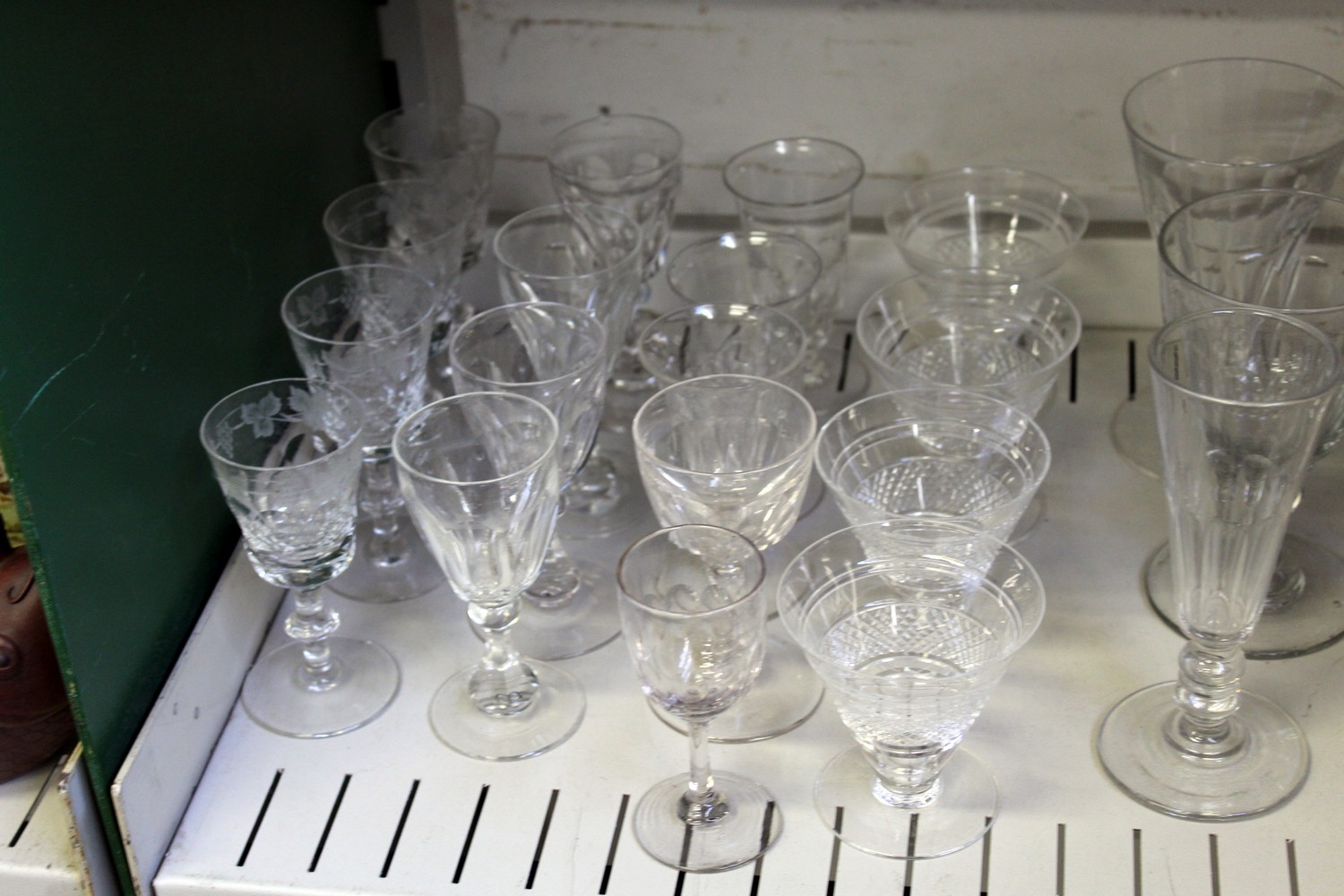 A shelf of cut glass drinking glasses. - Image 2 of 4