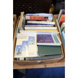 A box of art and antique related reference books.