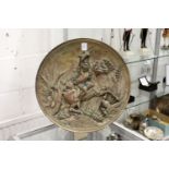 An Elkington embossed, plated copper charger, female figure on horseback (worn).