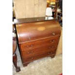 A mahogany cylinder bureau (AF).