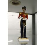 A Capodimonte small porcelain military figure.