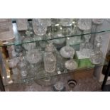A collection of cut glass decanters.