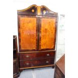 A George III mahogany and satinwood inlaid press cupboard.