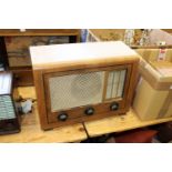 A GEC walnut cased radio.