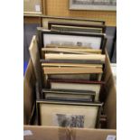 A box containing various prints etc.