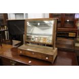 A George III mahogany dressing table mirrror with three drawers to the base.