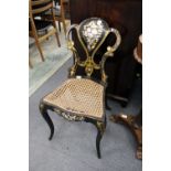 A Victorian papier mache cane seated occasional chair.