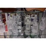 A collection of cut glass decanters.